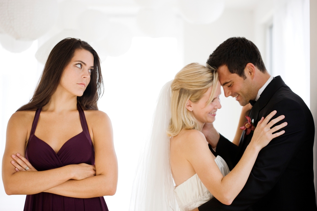 Woman mad at bride and groom
