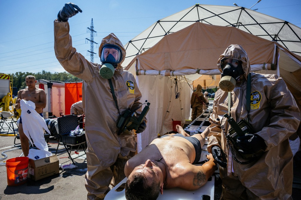 Ukrainian Emergency Ministry rescuers attend an exercise in the city of Zaporizhzhia on August 17.