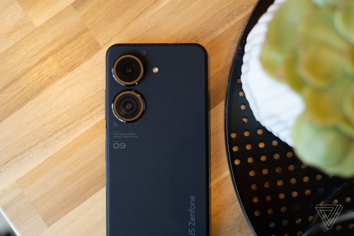 Asus Zenfone 9 lying on a table with rear panel facing up