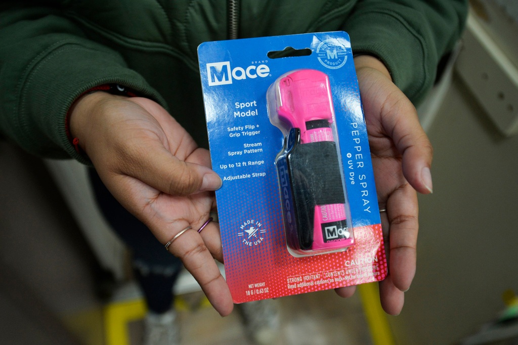 Many women are buying pepper spray at Esco Pharmacy in Hells Kitchen.