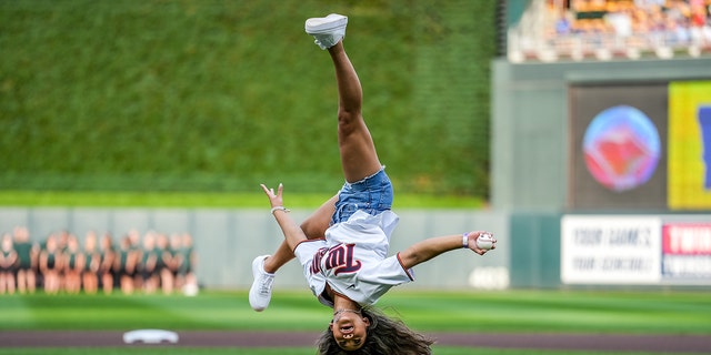 Olympian gymnast Sunisa Lee throws out the first pitch prior to the game between the Minnesota Twins and Toronto Blue Jays on August 5, 2022 at Target Field in Minneapolis.