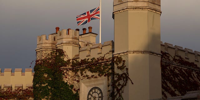 Flags are flown at half-mast on the Wentworth Club House following the announcement of the death of Her Majesty Queen Elizabeth II during Day One of the BMW PGA Championship at Wentworth Golf Club on September 08, 2022, in Virginia Water, England. 