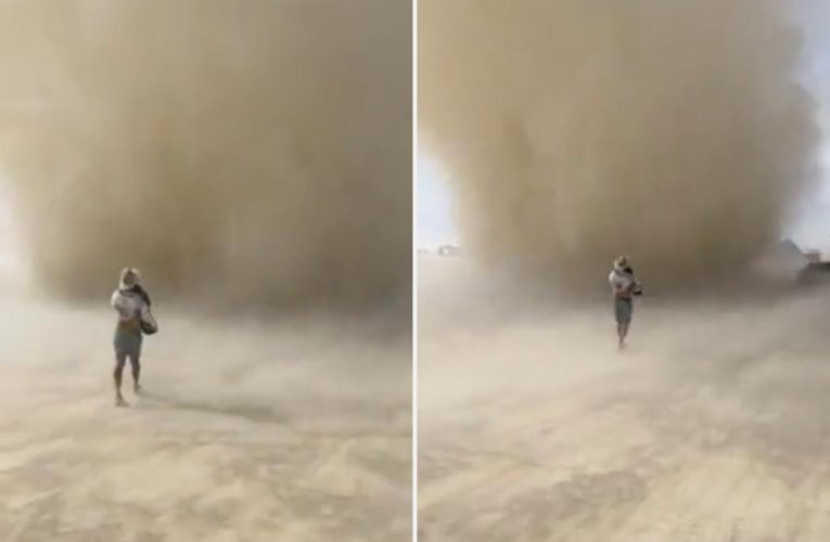Daredevil runs through dirt devil at Burning Man in shocking video