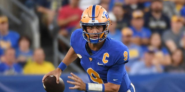 Kedon Slovis of the Pittsburgh Panthers scrambles out of the pocket in the first quarter during a game against the West Virginia Mountaineers at Acrisure Stadium Sept. 1, 2022, in Pittsburgh.