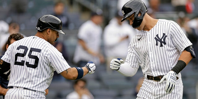 The New York Yankees' Aaron Judge celebrates with Gleyber Torres (25) after hitting a home run against the Minnesota Twins Wednesday, Sept. 7, 2022, in New York.