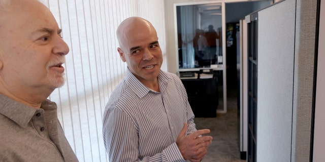 Clark County Public Administrator Robert Telles, right, talks to Las Vegas Review-Journal reporter Jeff German in his Las Vegas office on May 11, 2022.