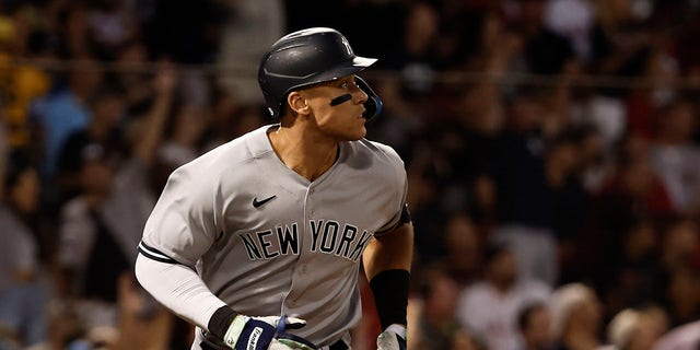 Aaron Judge #99 of the New York Yankees watches a home run against the Boston Red Sox during the third inning at Fenway Park on August 12, 2022 in Boston, Massachusetts.