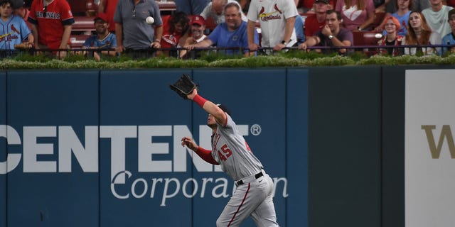 Joey Meneses of the Washington Nationals catches a fly ball during a game against the St. Louis Cardinals at Busch Stadium in St. Louis on Sept. 6, 2022.