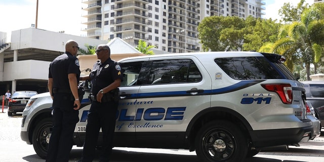 FILE - Police officers respond to a call in Aventura, Florida, on Oct. 26, 2018.