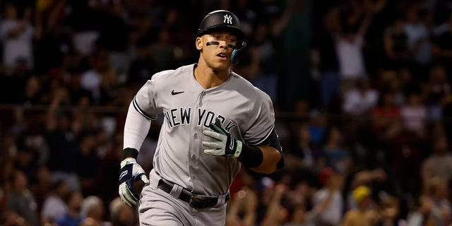 Aaron Judge, #99 of the New York Yankees, rounds the bases after a home run against the Boston Red Sox during the third inning at Fenway Park on August 12, 2022, in Boston, Massachusetts.