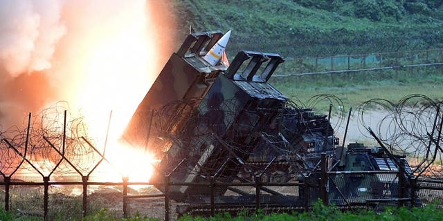 Photo released by the South Korean Defense Ministry, U.S. Army Tactical Missile System firing a missile into the East Sea during a South Korea-U.S. joint missile drill.