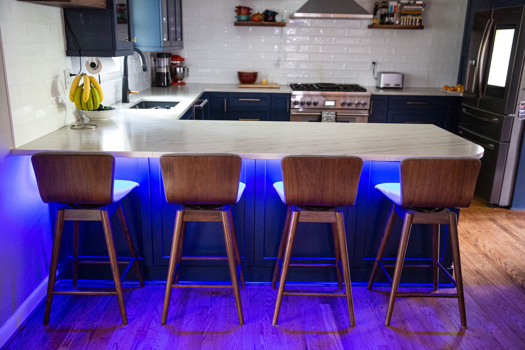 The Tapo light strip installed under a breakfast counter.