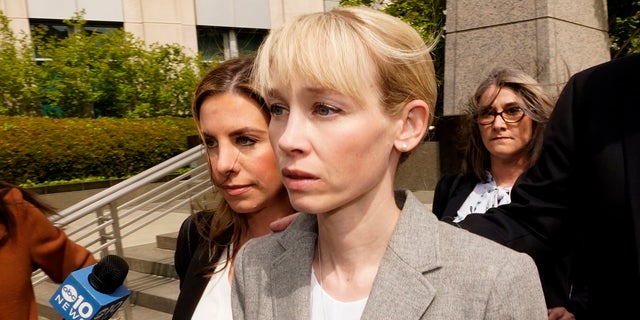 Sherri Papini leaves the federal courthouse after her arraignment in Sacramento, California, Wednesday, April 13, 2022. 