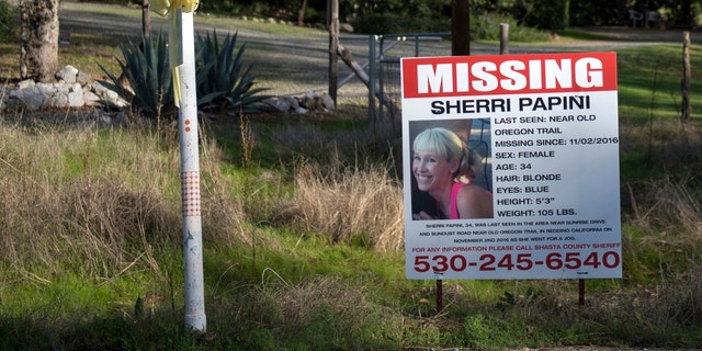 In this Nov. 10, 2016, file photo, a "missing" sign for Redding, California, resident Sherri Papini is seen near the location where the mother of two is initially believed to have gone missing while jogging. 