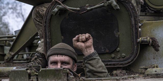 Ukrainian forces are seen in Izyum after Russian forces withdrew from the city in Kharkiv Oblast, Ukraine, on Sept. 16, 2022.