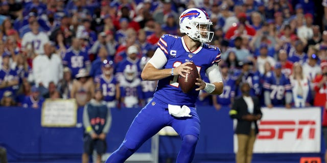 Josh Allen, #17 of the Buffalo Bills, looks to pass against the Tennessee Titans during the first half of the game at Highmark Stadium on Sept. 19, 2022 in Orchard Park, New York.