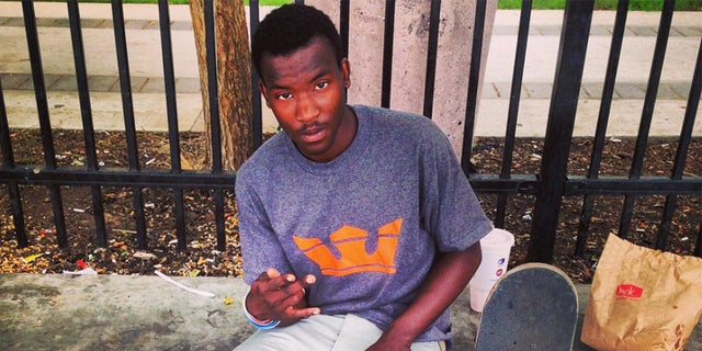 Vamazae Banks with his skateboard before he was arrested for an alleged gunpoint robbery of McDonald's in Long Beach, California.