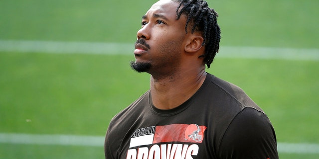 Cleveland Browns defensive end Myles Garrett walks on the field prior to the start of a game against the Indianapolis Colts on Oct. 11, 2020, in Cleveland.