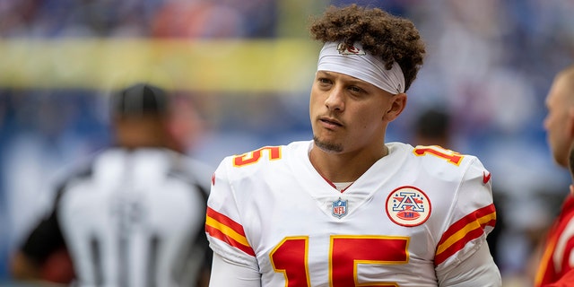 Sep 25, 2022; Indianapolis, Indiana, USA; Kansas City Chiefs quarterback Patrick Mahomes (15) looks on before the game against the Indianapolis Colts at Lucas Oil Stadium. 