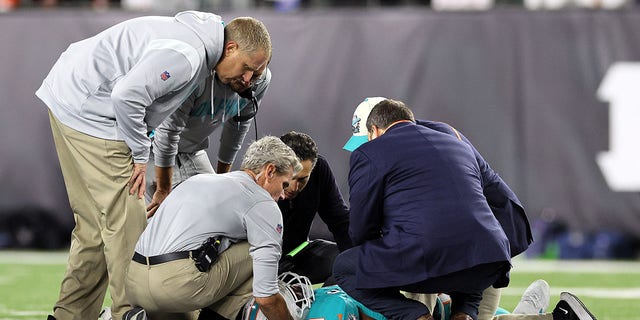 Medical staff tend to quarterback Tua Tagovailoa, #1 of the Miami Dolphins, after an injury during the 2nd quarter of the game against the Cincinnati Bengals at Paycor Stadium on Sept. 29, 2022 in Cincinnati.