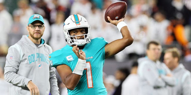 Quarterback Tua Tagovailoa of the Miami Dolphins warms up prior to a game against the Cincinnati Bengals at Paycor Stadium Sept. 29, 2022, in Cincinnati.