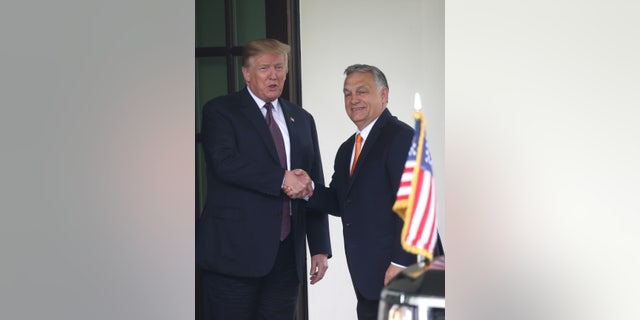 President Trump welcomes Hungary's Prime Minister Viktor Orban as he arrives at the White House May 13, 2019. 