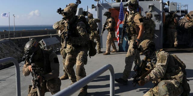 Members of the Special Operations Team of the Cypriot National Guard and U.S. Navy SEALs participate in a joint military training in Limassol, Cyprus, September 10, 2021. REUTERS/Yiannis Kourtoglou