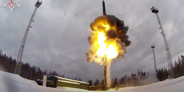 This photo taken from video provided by the Russian Defense Ministry Press Service on Saturday, Feb. 19, 2022, shows a Yars intercontinental ballistic missile being launched from an air field during military drills. 