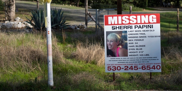 FILE - In this Nov. 10, 2016, file photo, a "missing" sign for Redding, Calif., resident Sherri Papini is seen near the location where the mother of two is initially believed to have gone missing while jogging. In March 2022, Papini was arrested on charges of faking her own kidnapping in 2016. She signed a plea deal on Tuesday, April 12, 2022 , in which she will plead guilty of lying to a federal officer and mail fraud, her attorney, William Portanova, first told The Sacrament Bee.