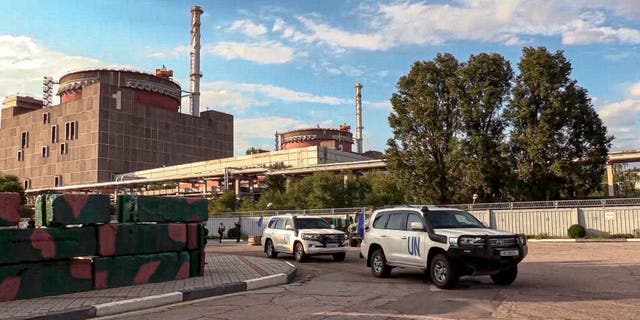 A motorcade with members of International Atomic Energy Agency leaves after inspecting the Zaporizhzhia Nuclear Power Plant in Enerhodar, southeastern Ukraine Thursday Sept. 1, 2022. 