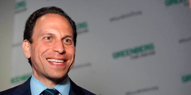 Mayoral candidate Craig Greenberg, above, answers questions from reporters on May 17, 2022, in Louisville, Kentucky. The candidate for Louisville mayor who was shot at by an assailant in his campaign office is pledging to crack down on confiscated firearms that police send to auction.