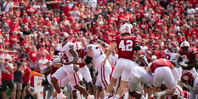 Oklahoma's Marcus Major (24) runs in a touchdown against Nebraska during the first half of a game Saturday, Sept. 17, 2022, in Lincoln, Neb. 