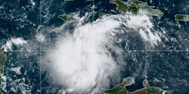 This satellite image provided by the National Oceanic and Atmospheric Administration shows Tropical Storm Ian over the central Caribbean on Saturday, Sept. 24, 2022. 