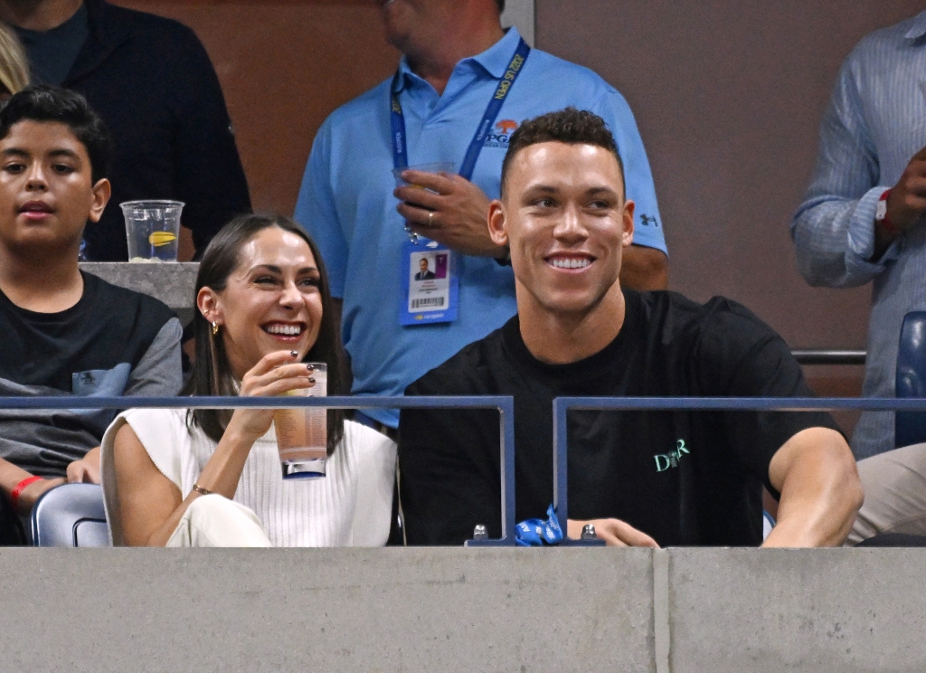 Aaron Judge and his wife Samantha Bracksiek take in a match at the US Open this week. 