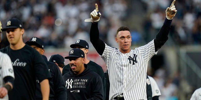 New York Yankees' Aaron Judge gestures to fans after defeating the Tampa Bay Rays in New York on Oct. 3, 2021.