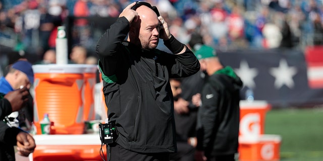 New York Jets defensive line coach Aaron Whitecotton is shown before a game against the New England Patriots at Gillette Stadium in Foxborough, Massachusetts, on Oct. 24, 2021.