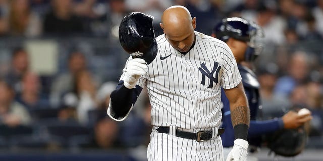 Aaron Hicks #31 of the New York Yankees strikes out to end the third inning against the Tampa Bay Rays at Yankee Stadium on September 09, 2022 in the Bronx borough of New York City. 