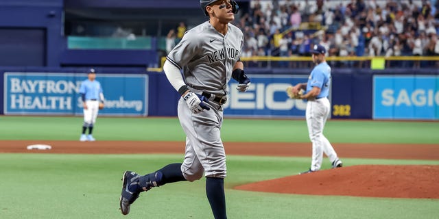 Aaron Judge of the New York Yankees rounds the bases after his home run against the Tampa Bay Rays during the ninth inning at Tropicana Field in St. Petersburg, Florida, on Sept. 3, 2022.