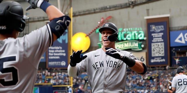 New York Yankees' Aaron Judge celebrates after hitting a home run during the first inning against the Tampa Bay Rays in St. Petersburg, Florida, on Sept. 4, 2022.