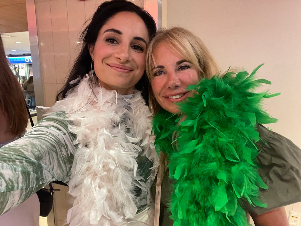 Adrianna Lauricella and her mom, Andrea, in their boas they each paid $20 for before the concert at costume shop Abracadabra near MSG.
