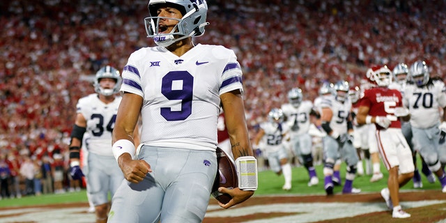 Kansas State quarterback Adrian Martinez celebrates after a touchdown against Oklahoma, Saturday, Sept. 24, 2022, in Norman.