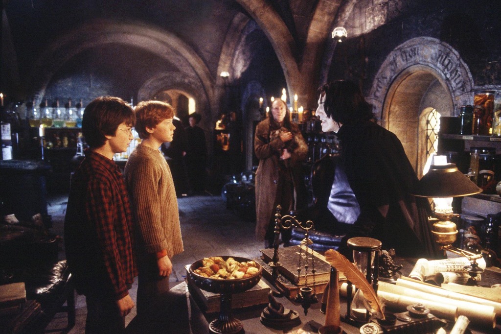 (L-r) Harry (DANIEL RADCLIFFE), Ron (RUPERT GRINT),  Filch (DAVID BRADLEY) and Professor Snape (ALAN RICKMAN) in Warner Bros. Pictures'  "Harry Potter and the Chamber of Secrets."  PHOTOGRAPHS TO BE USED SOLELY FOR ADVERTISING, PROMOTION, PUBLICITY OR REVIEWS OF THIS SPECIFIC MOTION PICTURE AND TO REMAIN THE PROPERTY OF  THE STUDIO. NOT FOR SALE OR REDISTRIBUTION   HARRY POTTER and all related indicia are trademarks of and  2002 Warner Bros. All Rights Reserved. Harry Potter Publishing Rights  J.K.R.