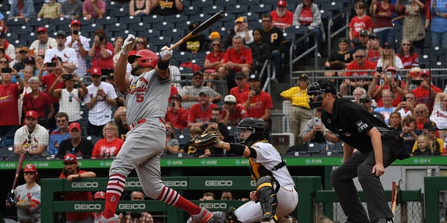 Albert Pujols #5 of the St. Louis Cardinals hits a two-run home run in the ninth inning during the game against the Pittsburgh Pirates at PNC Park on September 11, 2022 in Pittsburgh, Pennsylvania.