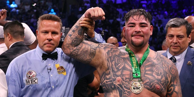 Referee Thomas Taylor lifts the arm up of Andy Ruiz Jr. after his unanimous decision win over Luis Ortiz during a WBC world heavyweight title eliminator fight on Sept. 4, 2022, in Los Angeles.