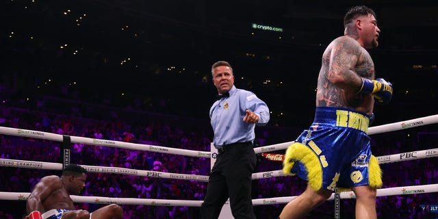 Andy Ruiz Jr. heads to a corner as directed by referee Thomas Taylor after knocking down of Luis Ortiz on his way to a unanimous decision win during a WBC world heavyweight title eliminator fight on Sept. 4, 2022, in Los Angeles.