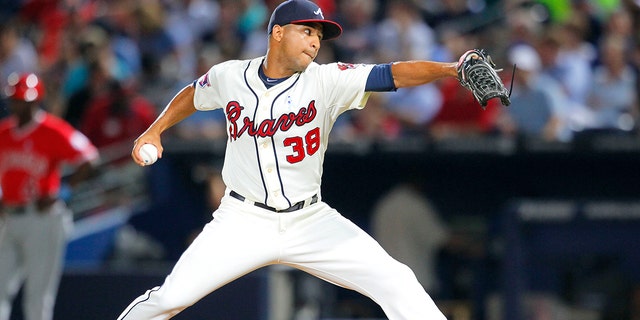 Atlanta Braves relief pitcher Anthony Varvaro delivers in the sixth inning of a baseball game against the Los Angeles Angels on June 15, 2014, in Atlanta.