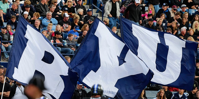 BYU flags fly in the stadium during a game between the BYU Cougars and the Oregon State Beavers during the first half of a college football game October 13, 2012, at LaVell Edwards Stadium in Provo, Utah.