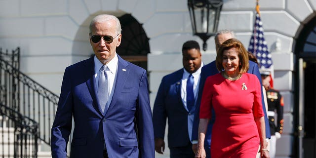 President Joe Biden, CEO of SparkCharge Joshua Aviv and Speaker of the House Nancy Pelosi (D-CA)