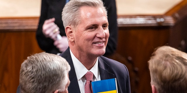 House Minority Leader Kevin McCarthy wears a Ukrainian flag in his pocket before the State of the Union address by President Biden at the Capitol, March 1, 2022.