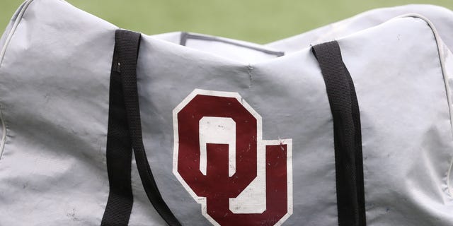 The OU logo on an equipment bag before a Big 12 football game between the Oklahoma Sooners and Kansas Jayhawks on Oct. 23, 2021.